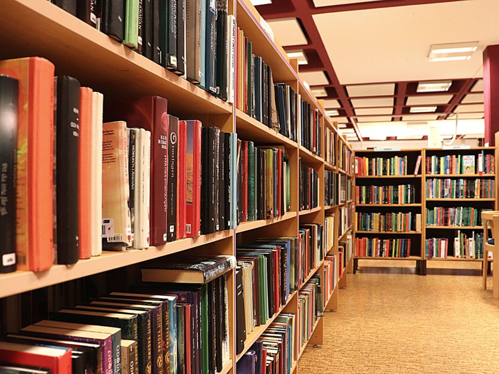 Rows of bookshelves filled with books