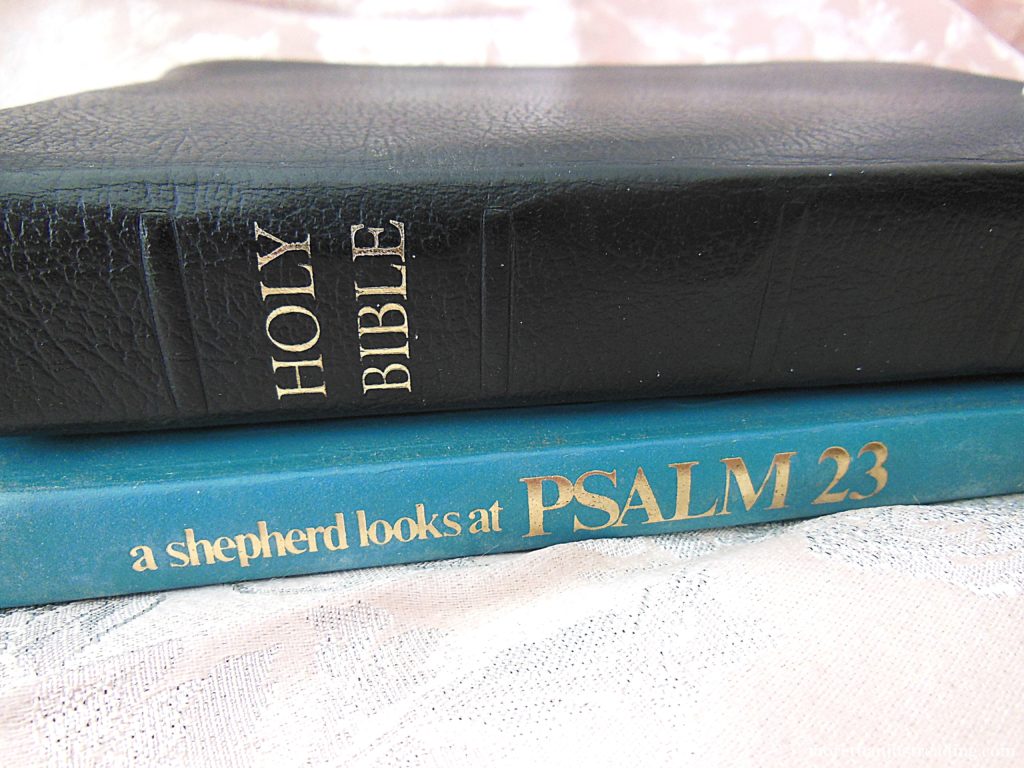 A Bible and a copy of A Shepherd Looks At Psalm 23 by Philip Keller