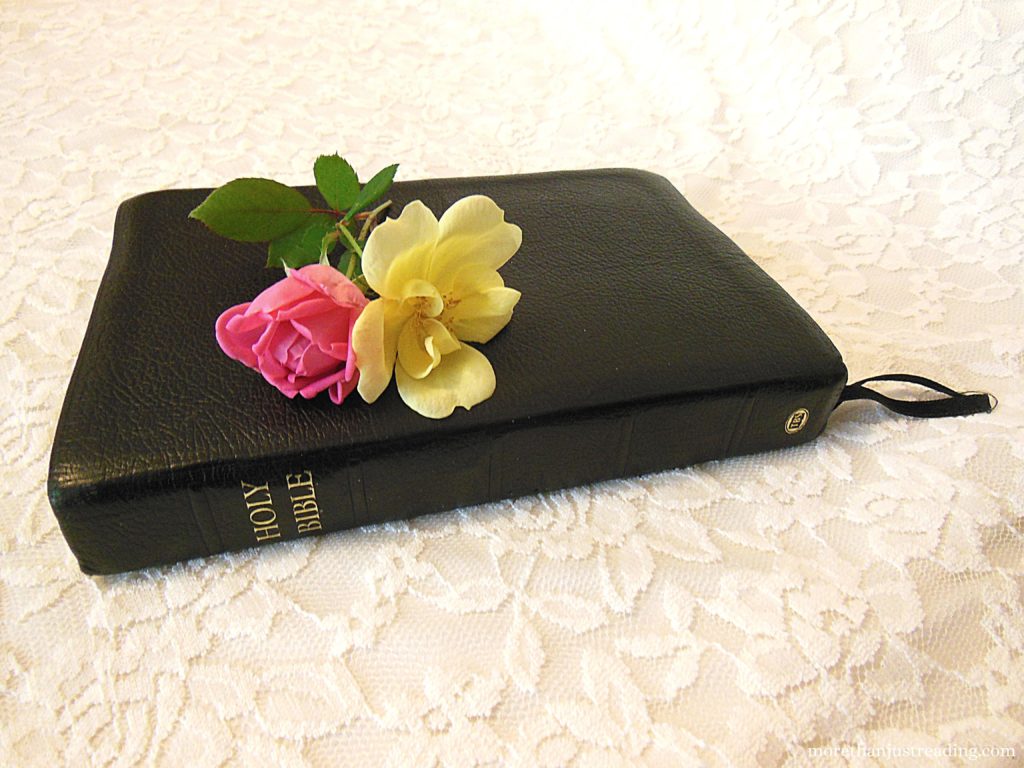 A Bible with roses on it