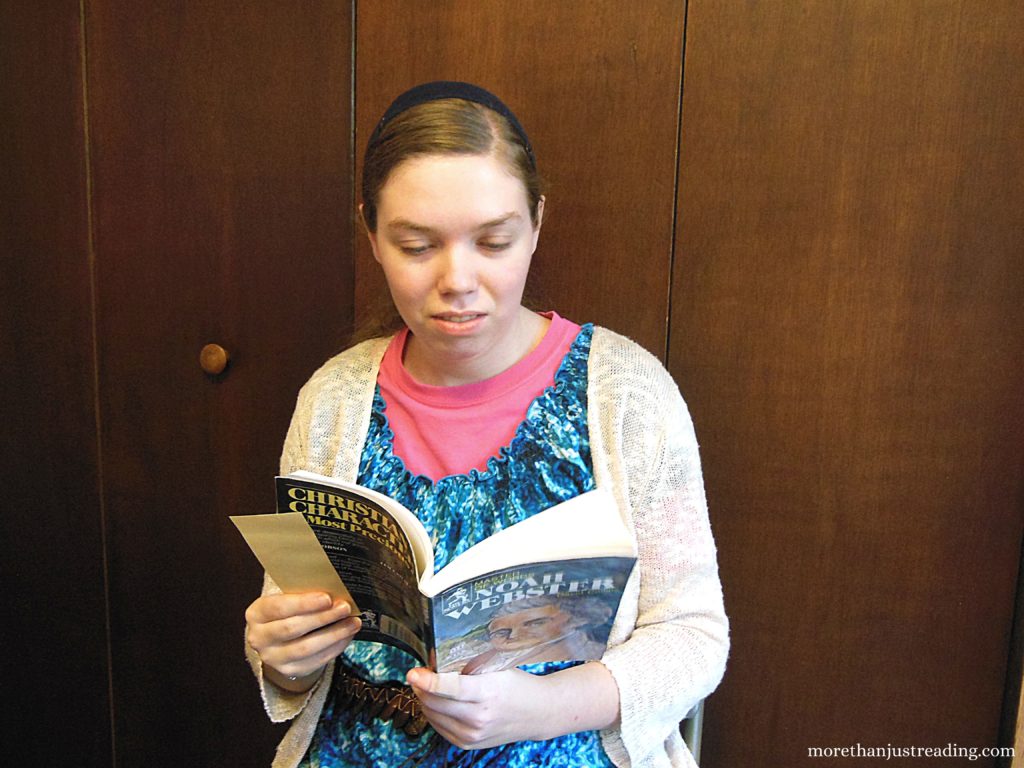 Girl reading a biography